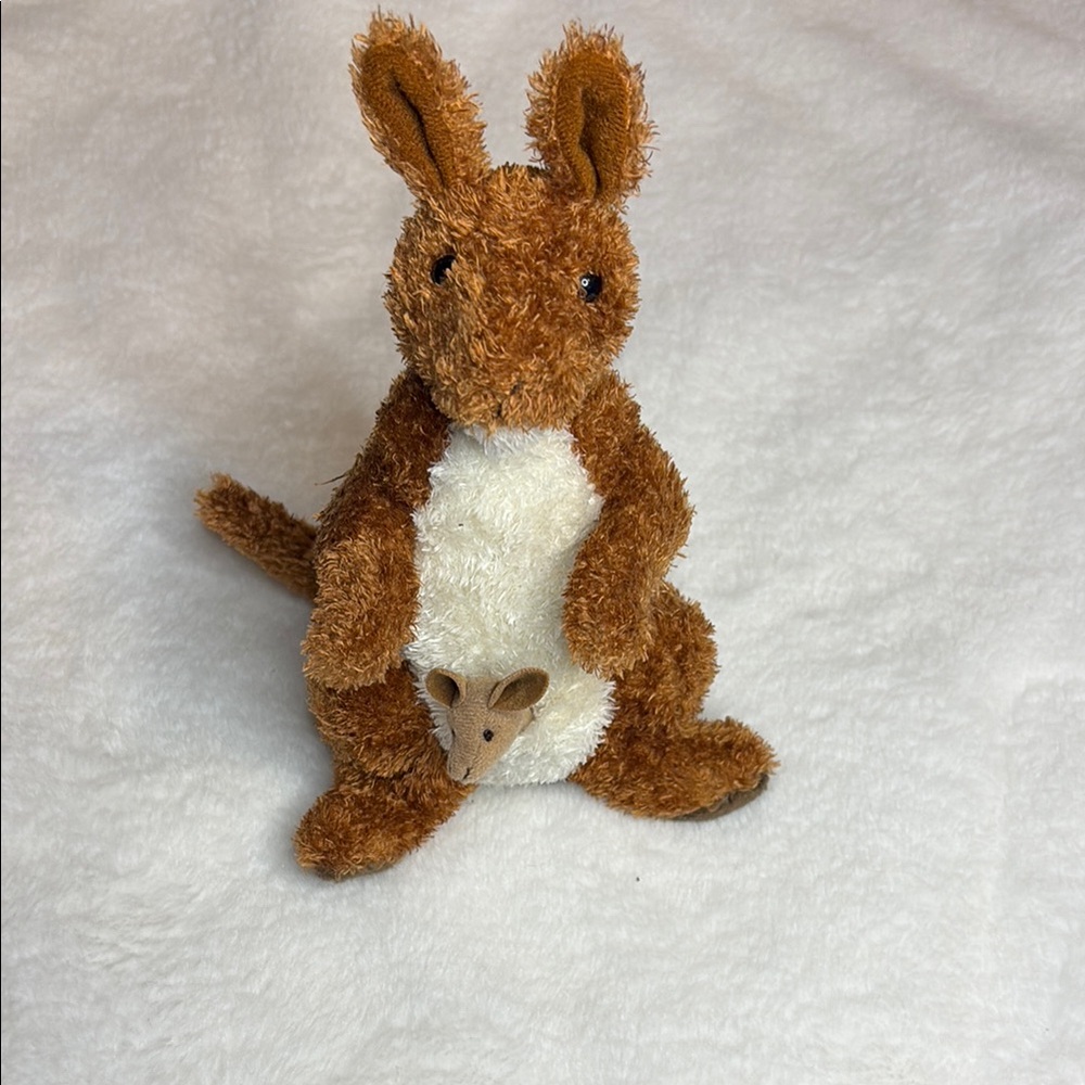 Brown and White Plush Rabbit Toy with Fluffy Texture